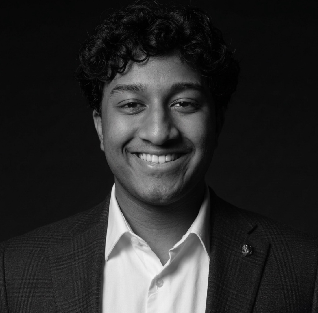 Aden in a suit